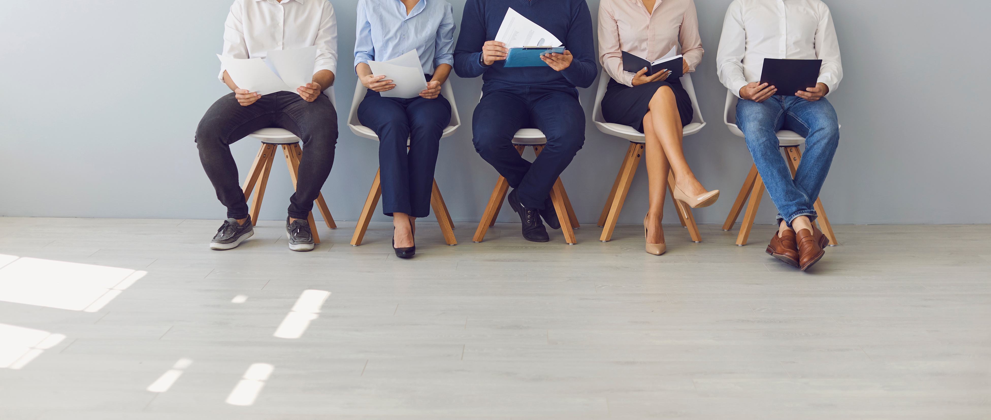 Group of People Waiting in Line for Job Interview or Office Workers Waiting for Boss's Invitation